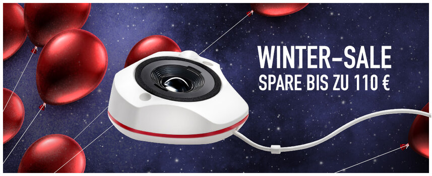 Kalibriergerät SpyderX von Datacolor vor Grafik mit blauem Sternenhimmel und roten Luftballons, rechts Schrift Wintersale. Spare bis zu 110€