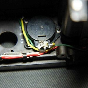 ...Modified the battery chamber. The battery contact is now stronger than when the camera was new