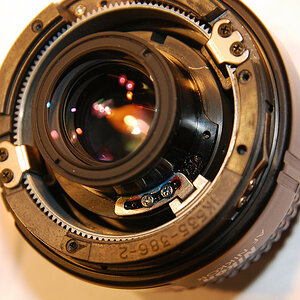 AF-Nikkor 24/2.8 mit verölter Blende, dem ich die Blende entölt habe.