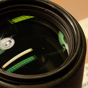 Nikon 80-200 Fleck hinter Frontlinse