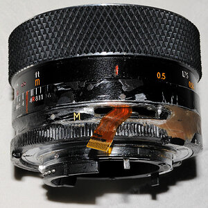 Umbau eines alten ALPA 55mm/1.4 MF-Objektivs für M42 auf Nikon-Anschluss mit CPU-Chip eines AF-S DX 18-55/3.5-5.6 ED, das auf die Brennweite 55mm und 