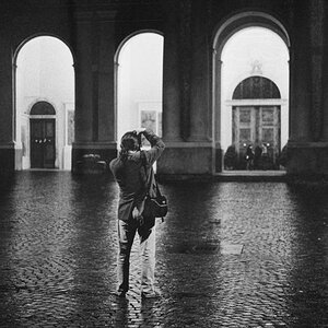 Roland taking pictures in the rain