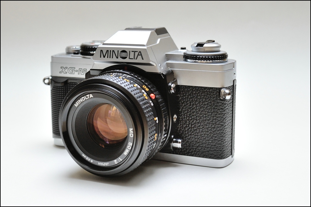 comp minolateXGM 8203