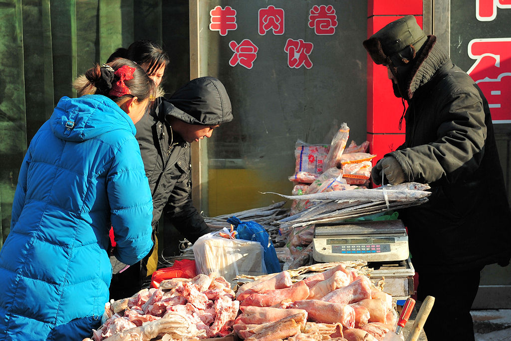Markt in Huanan,
Marktstand
(9800)