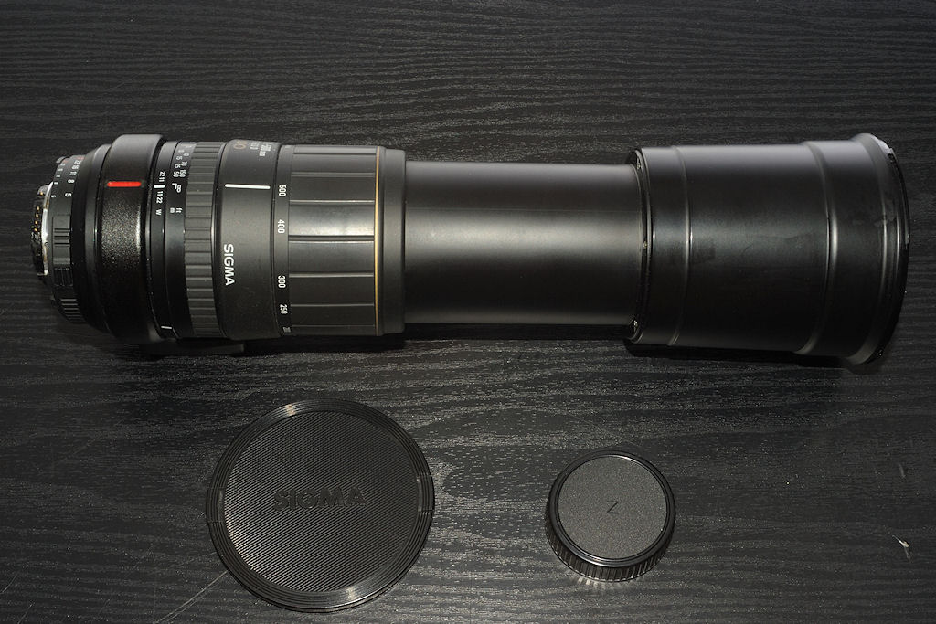 Mein defekt gekauftes und repariertes SIGMA AF 170-500 APO Telezoom:
Die CPU-Platine und alle Kabel waren herausgerissen, der Rear-Fokus-Trieb war an 