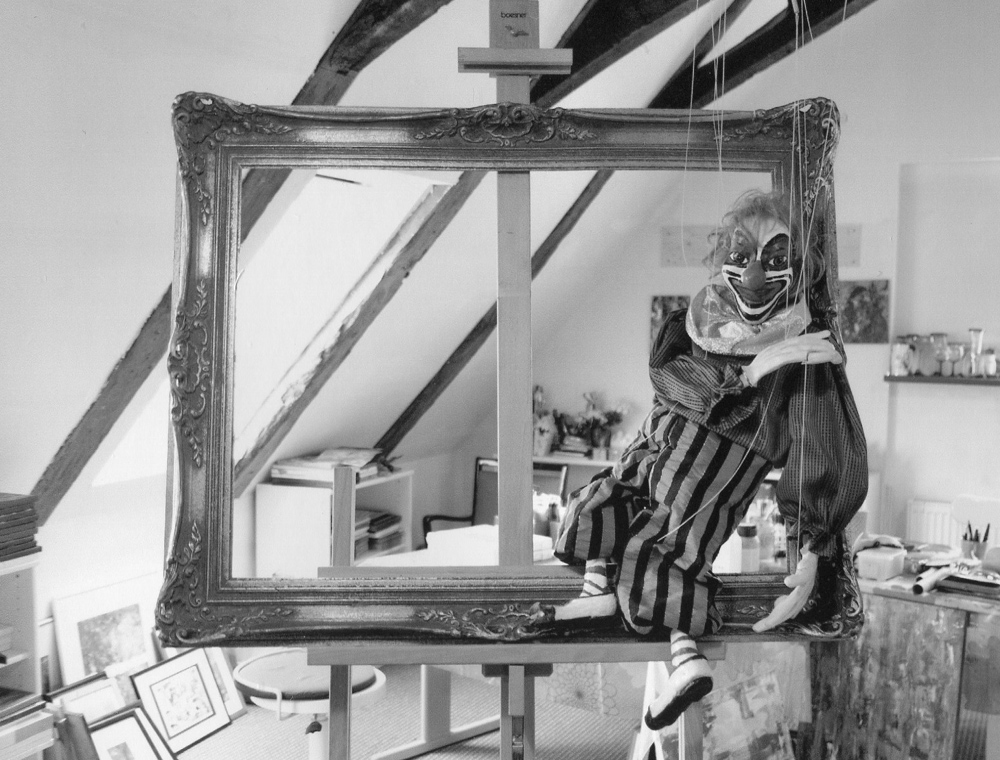 Rahmen mit Marionette
