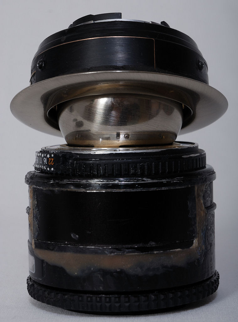 Selbstgebautes Lensbaby-Composer-Klon mit CPU:
Komplett mit Makroobjektiv, von der Seite, stehend