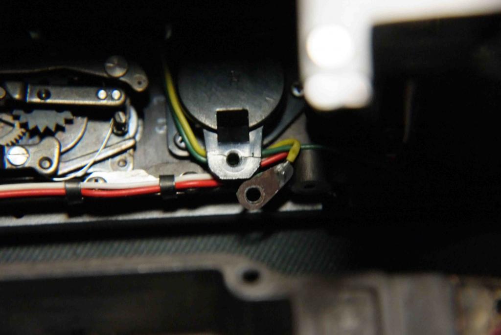 The battery chamber was cracked, and the tag corroded, see Photo 2. It surprised me power still got through....