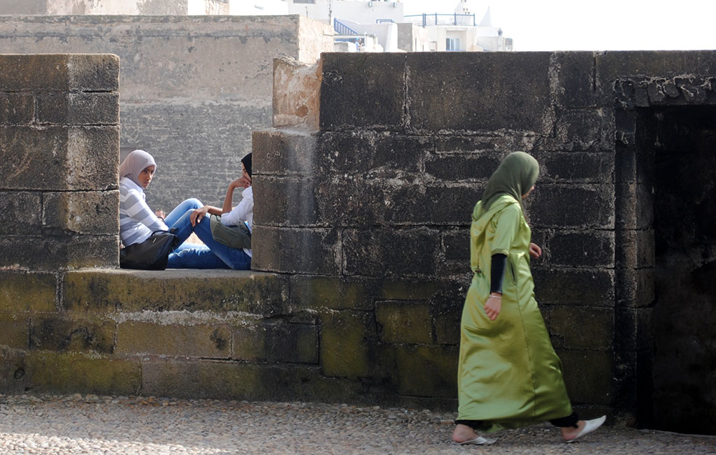 Young girls on the city wall of Essaouira